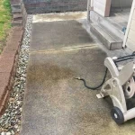 pressure washed front driveway before photo in kenova washington 2