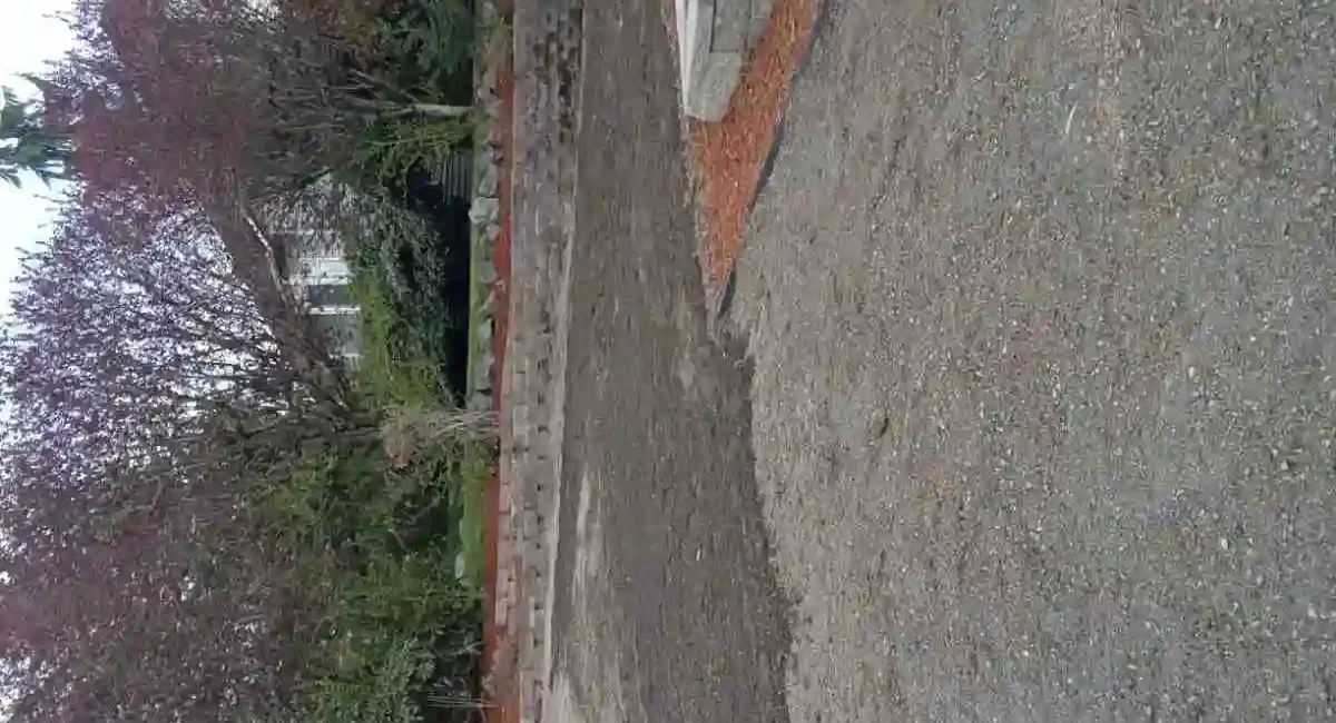 yard restoration retaining wall landscape mulch Marysville Washington